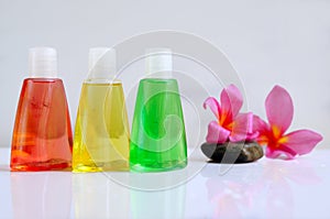 Toiletries with plumeria flowers