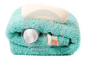 Toiletries (toothbrush, soap, towel) photo