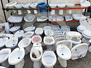 Toilets and sinks in a second-hand store