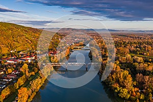 Tokaj, Hungary - Aerial view of the town of Tokaj with bridges over River Tisza, golden vineyards on the hills of wine region