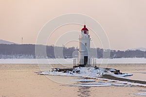Tokarevsky lighthouse in Vladivostok at dawn on a cold winter morning