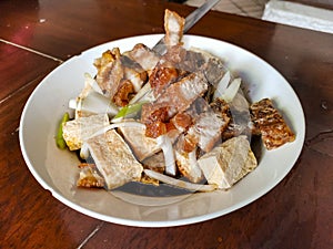 Tokwa`t Baboy, a popular Filipino appetizer or pulutan served in a restaurant or bar photo