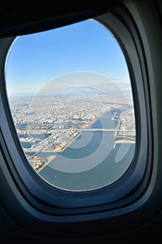 Tokyo Area from Airplane Window Jet Engine Wing