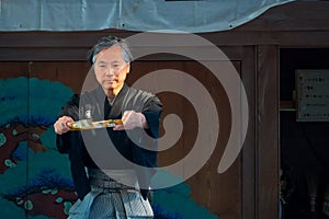 People perform Japanese fan dance  in Bunkyo Azalea Festival Tsutsuji Matsuri at Nezu Shrine