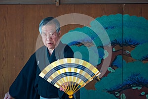 People perform Japanese fan dance  in Bunkyo Azalea Festival Tsutsuji Matsuri at Nezu Shrine