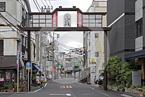 The gate leading to the old fashioned shitamachi village shopping district of Yanaka Ginza in northern Tokyo