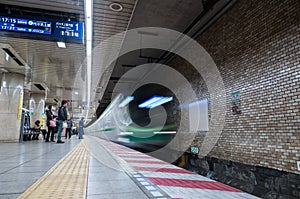 TOKYO, JAPAN - FEBRUARY 18, 2018: Tokyo Subway Metro Station with Fast Moving Train