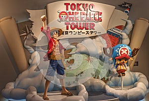 Reindeer Tony Tony Chopper and pirate monkey d. luffy on display in the Tokyo One Piece Tower.