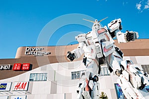 Odaiba Diver City Tokyo Plaza shopping mall and real-size Gundam robot in Tokyo, Japan