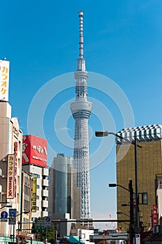 TOKYO, JAPAN - OCTOBER 31, 2017: View of the television tower against the blue sky. Vertical. Copy space for text.