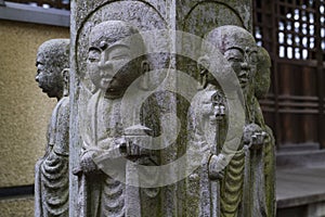 Tokyo - Japan - Peaceful stone religious Buddha statues