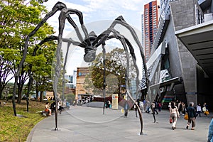 Tokyo, japn - April 28, 2019 : Tourist walk around maman spider that located at mori art museum, roppongi hill, Tokyo