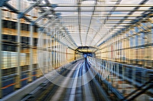 Tokyo monorail transportation system Yurikamome Line in tunnel. Blurred with speed