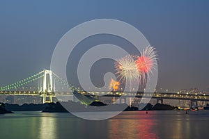 Tokyo rainbow bridge with beautiful firework