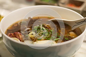 Tokyo ramen noodles with peppery Harissa beef ribs in chicken broth