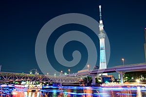 Tokyo skytree blue illumination along Sumida river