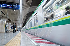 TOKYO, JAPAN - FEBRUARY 18, 2018: Tokyo Subway Metro Station with Fast Moving Train