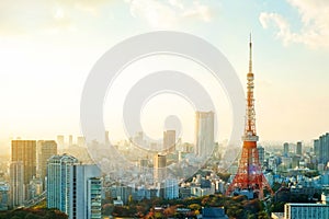 Tokyo tower, landmark of Japan, and panoramic modern city bird eye view with dramatic sunrise and morning sky