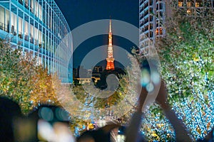 Tokyo Tower with Roppongi Hills Christmas Illumination, light up christmas market in Tokyo, Japan., landmark and popular for