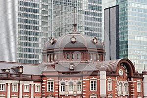 Tokyo train station with skyscrapers