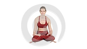 Tolasana or Scale Pose Beautiful woman do Yoga sitting arm lift