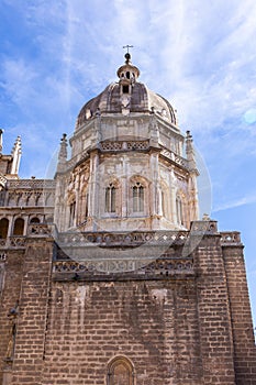 Toledo Cathedral, Gothic church facade of Mozarabic chapel dome seen from Plaza del Ayuntamiento, Toledo, Spain photo