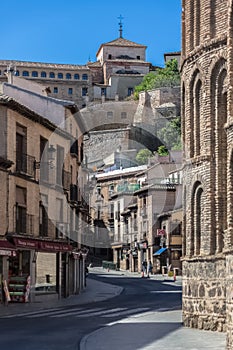 View at the Real del Arrabal street on Toledo city downtown, and Carmelitas Descalzos Convent on top as background photo