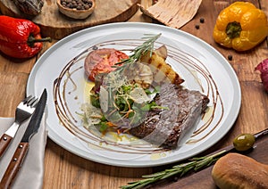 Toliet steak on a white plate