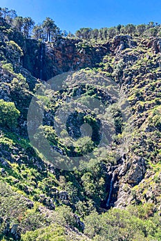 Hiking trail to waterfalls over river Caballos, Sierra de la Nieves National Park in Tolox, Malaga photo