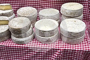 Tom de Savoie cheese at the farmer's market photo