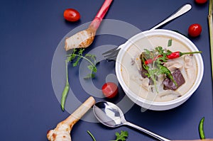 Tom Kha Kai or Spicy Chicken Soup with Coconut Milk - Thai food