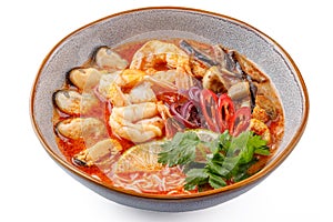 Tom Yam with seafood on a white background studio food photo 3