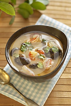 Tom yam soup with shrimps, mushrooms and coconut milk