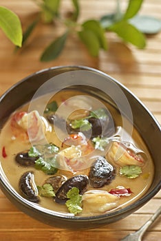 Tom yam soup with shrimps, mushrooms and coconut milk