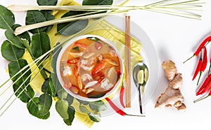 Thai Tom Yum Goong or spicy tom yum soup with prawns shrimps