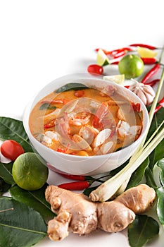 Thai Tom Yum Goong or spicy tom yum soup with prawns shrimps