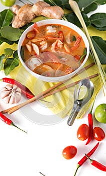 Thai Tom Yum Goong or spicy tom yum soup with prawns shrimps