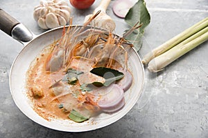 Tom yum kung or tom yam kung  is a type of hot and sour famouse food in Lao and Thai soup,usually cooked with shrimp.Tom yum has