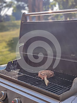 Tomahawk beef steak on a grill