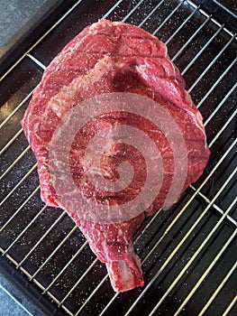 Tomahawk steak raw