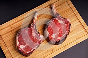 Tomahawk Steak on wood board