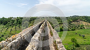 Aqueduct of Tomar near the templar castle. Tomar, Portugal photo
