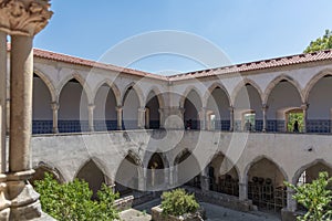 View at the ornamented romanesque wash cloister, or Claustro da Lavagem, an iconic piece of the Portuguese romanesque type, on photo