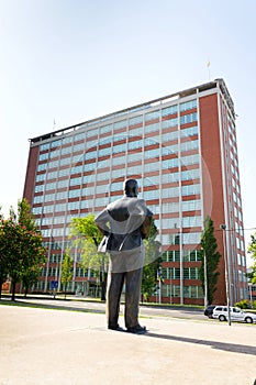 Tomas Bata statue with skyscraper 21, Zlin, Moravia, Czech Republic