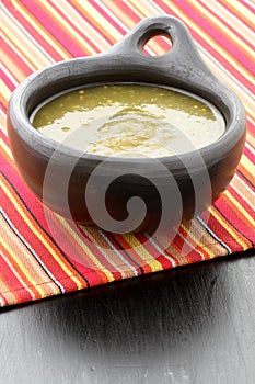 Tomatillo sauce in colombian clay dish