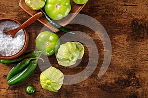 Tomatillos, green tomatoes, and chili peppers. Mexican cuisine ingredients