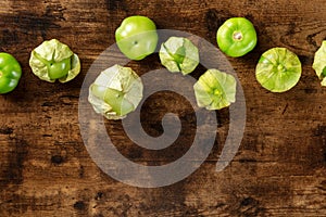 Tomatillos, green tomatoes, shot from the top with a place for text