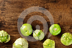 Tomatillos, green tomatoes, top shot with copy space. Mexican food