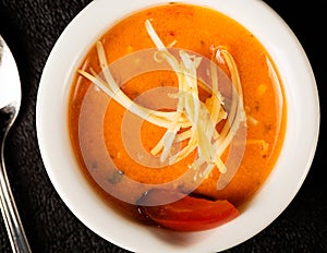 Tomato Bisque Soup in White Bowl and Spoon