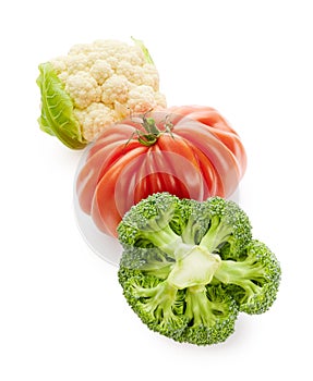 Tomato, broccoli and cabbage isolated on white background